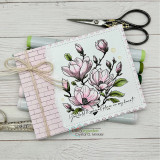 Card using the paper pack: soft pink magnolia blooms layered on the patterned paper.
