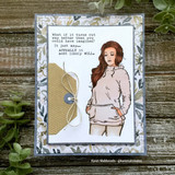 Girl in a soft pink hoodie with a kraft tag on a leafy paper card, stamped 'What if it turns out way better than you could have imagined?'.