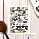 Card using the rose background stamped in soft cream and gold, layered with a black frame and a 'Hugs & Love' sentiment.
