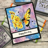 Mixed-media card with a yellow butterfly and rose over the script background, 'happy love day.'