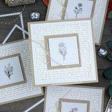 Small framed cards with the script love-letter background and tiny flowers.