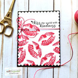Kiss the World card, repeated lipstick kiss prints in red and pink making a graphic pattern.