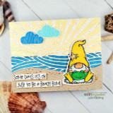Beach gnome in a yellow hat on a kraft beach scene with a sunburst, 'Some days it's ok just to be a beach bum.'