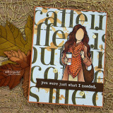 Autumn card with the coffee-word background, a girl in a plaid scarf with a cup and 'you were just what I needed.'
