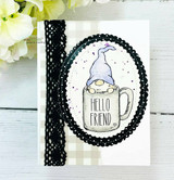 Handmade card featuring the gnomes tucked inside steaming coffee mugs, in a black-and-white oval frame, stamped with 'Hello Friend'.