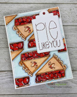 Card covered in cherry pie slices on pale blue with a stitched 'Pie like you' tag