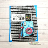 Bright blue-edged card with the dashed background stamped in black, a blue instant camera image and the words 'hello OLD FRIEND'.