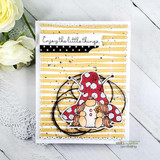 Card with mustard wonky stripes behind a mushroom image and "Enjoy the little things."