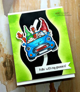 Bright card with gnomes packed into a blue convertible, stamped 'Rollin' with my gnomies!'