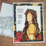 Itty bitty flower-crown girl on a rose-framed card, 'ENJOY YOUR DAY'.