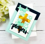 Card with a gold foil cross over a mint floral background and a die-cut 'prayers.'