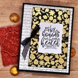 Card with 'By His wounds we are healed' over a dramatic black-and-gold floral panel with black ribbon.