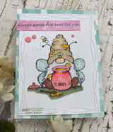 Jeanie Hays' bee-winged gnome holds a honey pot with 'always gonna bee here for you,' a red rubber friendship stamp shown on a card.