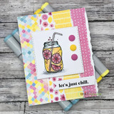 Card with the colored lemonade jar on pastel patterned panels, 'let's just chill.'