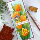 Tall card with orange and yellow tulips and pansies made using the Layering Tulip stencil