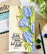 Blue tulips over kraft with the Layering Tulip stencil and 'The Lord will fight for you, you need only be still'