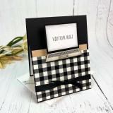 Black and white buffalo check card with a black mat, a stamped laptop propped at the top and virtual hugs typed across its screen.