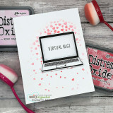 White card with a coral heart confetti arc blended above a stamped laptop reading virtual hugs, pink ink pads and a blender beside it.