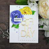 Sample card with periwinkle and yellow blooms beside a gold BIRTHDAY die cut on a scalloped panel, finished with pastel enamel dots.