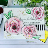 Sample card with three blooms watercolored in soft pink with gold splatter, layered over a striped strip, stamped 'happy birthday' and 'Wishing you everything wonderful and lovely'.