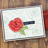 Sample card with one red bloom and leaf colored over a tone-on-tone outlined bloom background, finished with a navy strip reading 'LOVE YOU'.