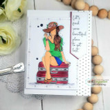 Clean card with the girl in a green top on a red suitcase and the 'beautiful place to get lost' sentiment.
