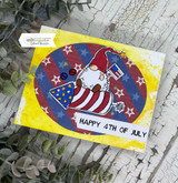 Bright card with the star-spangled gnome on a yellow starburst and 'Happy 4th of July.'