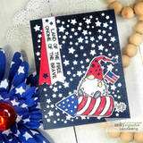 Navy star-print card with the gnome riding a firework and 'land of the free gnome of the brave.'