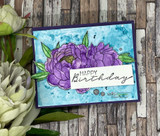 Card with a purple peony on a blue watercolor panel and 'Happy Birthday.'