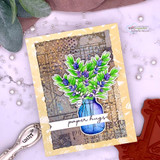 Card of the olive-leaf bouquet in a blue jar on a distressed frame, 'paper hugs.'