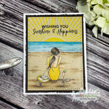 Beach girl in a yellow suit under a stamped sunburst, 'Wishing you sunshine & happiness,' vintage postage frame.