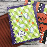 Card using the lined notebook-paper background behind cute stamped ghosts with a 'Happy Halloween' greeting on purple polka-dot layers.