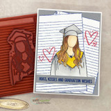 Card with lined-paper panels behind a graduate girl, hearts, and 'Hugs, kisses and graduation wishes.'