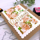 Peach floral scalloped card with gold Happy Retirement script lettering.