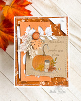 Orange leaf-print card with the pumpkin and cup on a stitched kraft panel with white leaf die-cuts.
