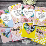 A spread of bright floral cards in pink, yellow and turquoise, each using one of the script sentiments on a die-cut heart or hexagon.