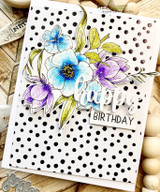 Blue and purple anemones on a black polka-dot card, 'happy Birthday.'