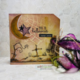 Handmade Halloween card with a witch stirring a bubbling cauldron beside a spooky graveyard scene, sentiment 'This is Halloween'.