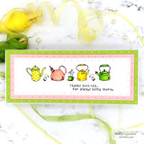 Green and pink dotted card with a slimline row of yellow, coral and green teapots, tea bags and a cup, stamped 'Thanks best-tea... For always being there.'