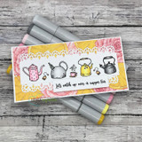 Card with a yellow and pink rose background and a white lace strip, a row of coloured kettles and teapots, stamped 'Let's catch up over a cuppa tea'.