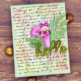 Sample card with the girl gnome tucked in a pink calla lily over a green script background with a die-cut 'hello' and leaves.