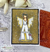 Card of the tin tile background in gold with a stamped angel, 'PEACE ON EARTH'.