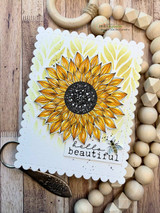 White card with the yellow sunflower and a small bee, 'hello beautiful.'