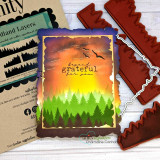 Card with a glowing sunset landscape, 'grateful,' beside a stencil.
