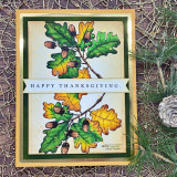 Card with green-and-gold oak leaves and acorns and a 'Happy Thanksgiving' banner.
