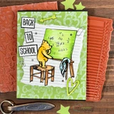 Green card with the number background behind a bear at a chalkboard, with letter tiles reading Back to school.