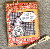Orange polka-dot card with a mummy gnome and 'Have a spooky day!'