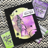 Card with the witch on a purple panel in a black frame with Distress inks, 'Happy Halloween brew-tiful.'