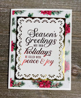 Card with a fancy black frame around 'Season's Greetings' on white with red poinsettia accents.