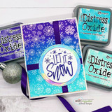 Bright blue card with 'LET IT SNOW' in a circle over the layered snowflake background.